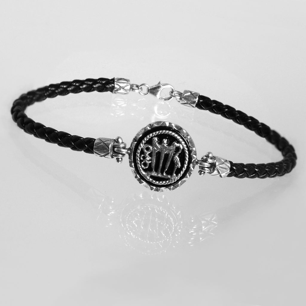 Bracciale Moneta in Argento 925/000 e Cuoio.